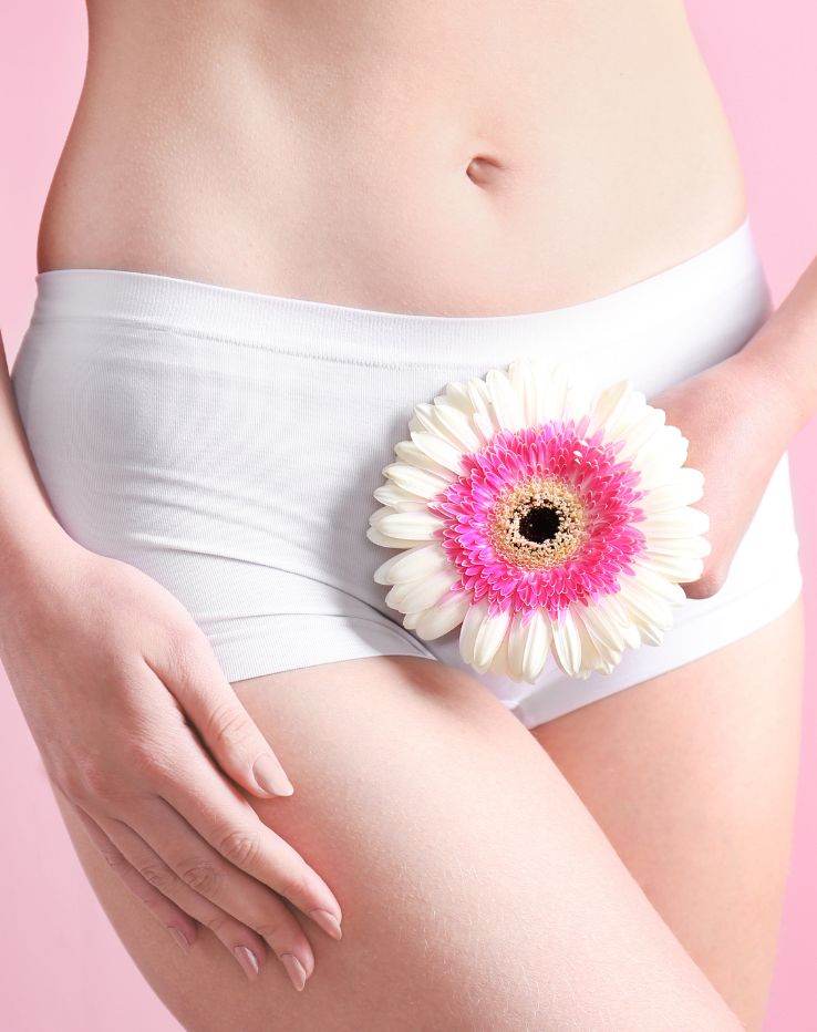 Young Woman Holding Flower 